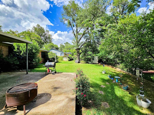 3008 Oak Knob Dr, Tyler, TX 75701 - view of grassy yard with a patio