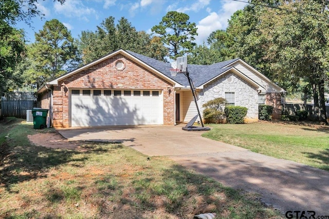 view of front facade featuring a garage and a front lawn