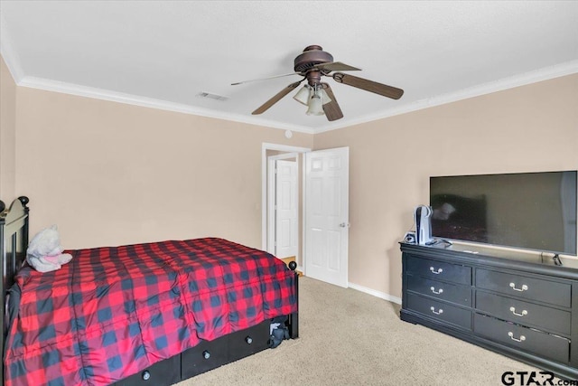 bedroom with ornamental molding, light colored carpet, and ceiling fan