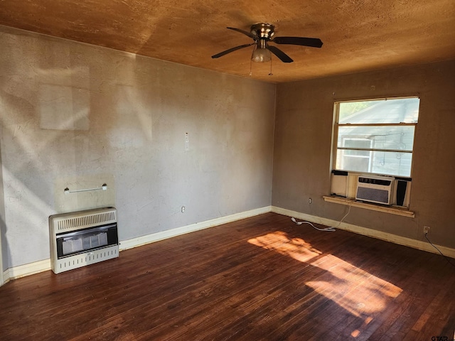 unfurnished living room featuring hardwood / wood-style flooring, a ceiling fan, heating unit, and cooling unit
