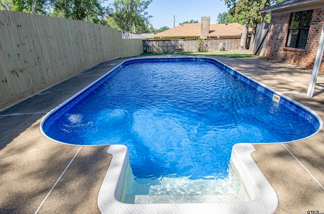 view of pool with a patio