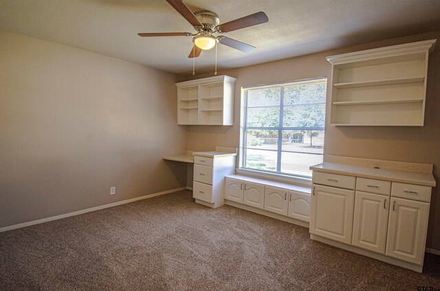 unfurnished office with light colored carpet and ceiling fan