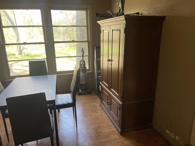 dining area featuring hardwood / wood-style flooring