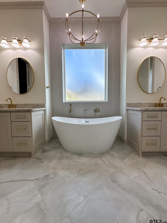 14438 Woodland Crk, Tyler, TX 75706 - full bath with crown molding, a freestanding bath, a chandelier, two vanities, and marble finish floors