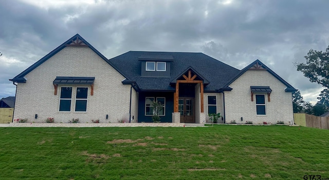 14438 Woodland Crk, Tyler, TX 75706 - view of front of house featuring brick siding and a shingled roof