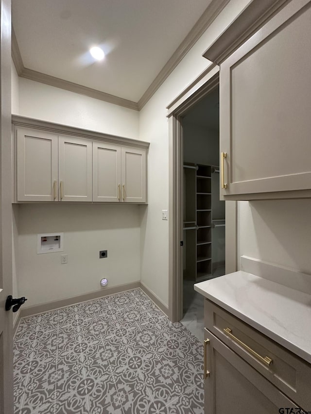 14438 Woodland Crk, Tyler, TX 75706 - laundry room featuring hookup for a washing machine, electric dryer hookup, crown molding, and cabinet space