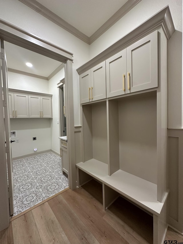 14438 Woodland Crk, Tyler, TX 75706 - mudroom with ornamental molding and wood finished floors