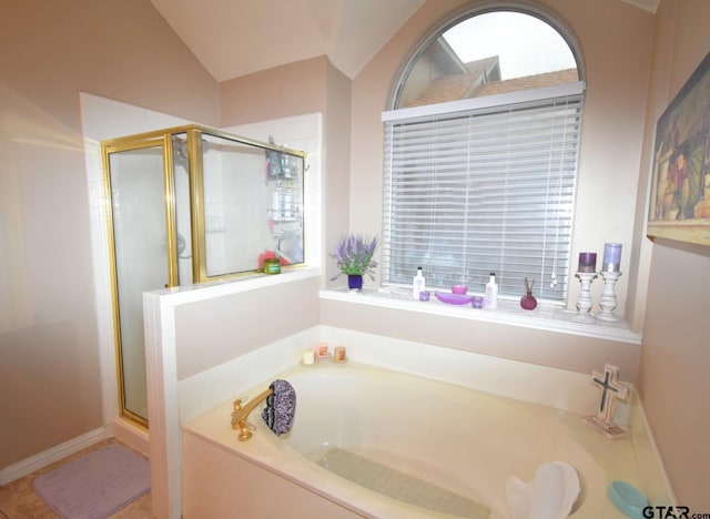 2333 Baretta Dr, Mesquite, TX 75181 - full bathroom with a bath, a stall shower, and lofted ceiling