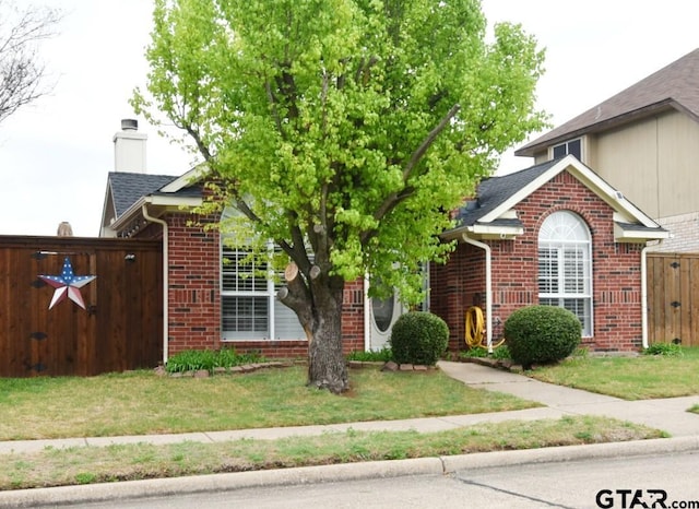 2333 Baretta Dr, Mesquite, TX 75181 - view of front of property featuring brick siding and a chimney