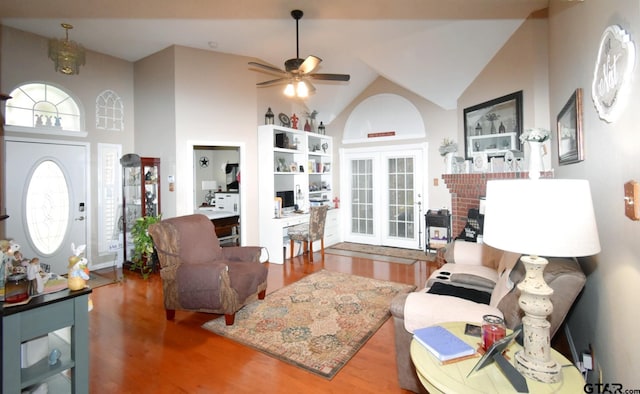 2333 Baretta Dr, Mesquite, TX 75181 - living room with wood finished floors, ceiling fan, and high vaulted ceiling