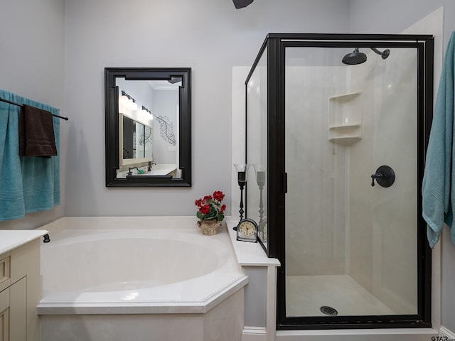 1857 Stonecrest Blvd, Tyler, TX 75703 - full bathroom with a shower stall, a garden tub, and vanity
