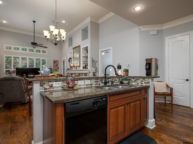 1857 Stonecrest Blvd, Tyler, TX 75703 - kitchen with dishwasher, a sink, brown cabinets, a ceiling fan, and open floor plan