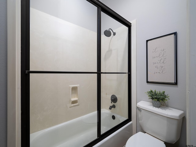 1857 Stonecrest Blvd, Tyler, TX 75703 - full bathroom featuring toilet and combined bath / shower with glass door