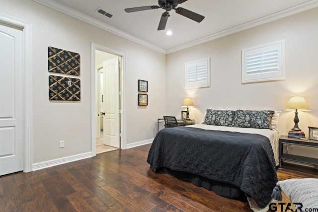 bedroom with dark hardwood / wood-style flooring, ornamental molding, and ceiling fan