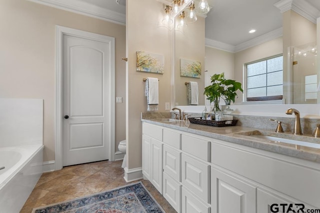 bathroom featuring a bathtub, vanity, toilet, and crown molding