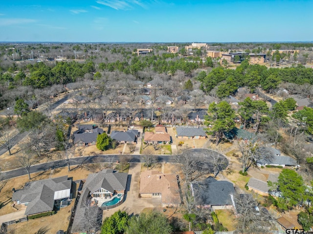 birds eye view of property with a residential view