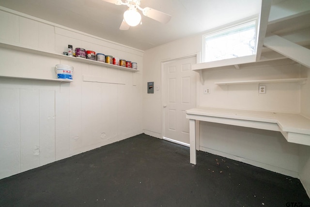 interior space with ceiling fan