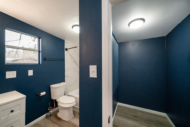 bathroom with a shower, wood-type flooring, toilet, and vanity