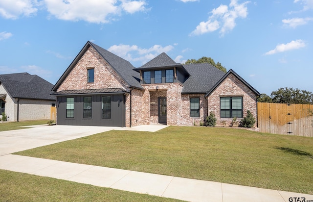 view of front of house with a front lawn