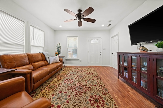 301 W Charnwood St, Tyler, TX 75701 - living room featuring light wood-type flooring, ceiling fan, baseboards, and recessed lighting