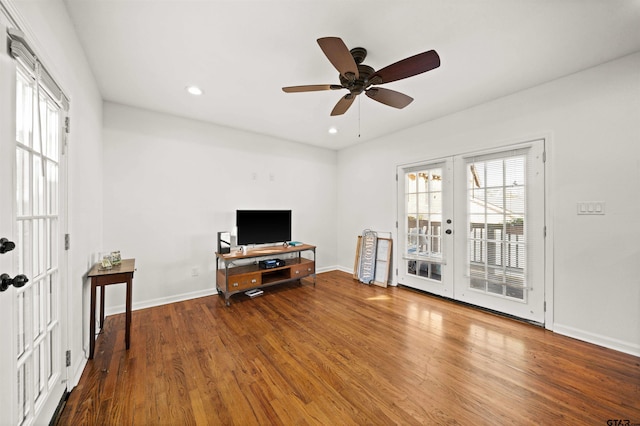 301 W Charnwood St, Tyler, TX 75701 - living area with french doors, wood finished floors, healthy amount of natural light, ceiling fan, and recessed lighting