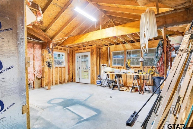 misc room with lofted ceiling