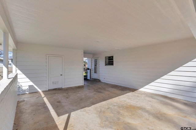 view of patio / terrace with a carport