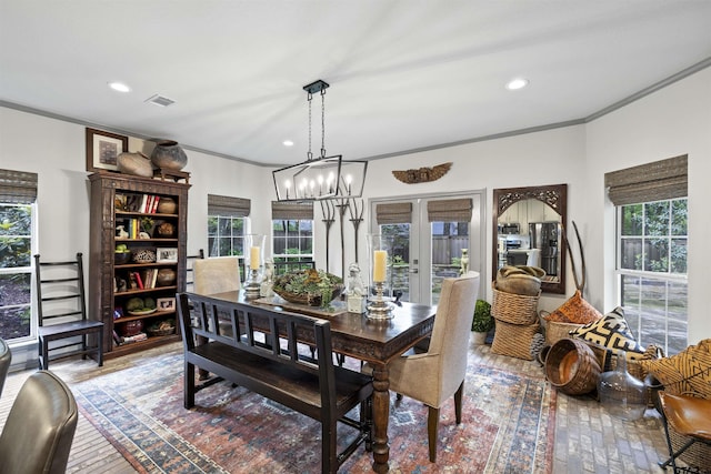 dining space featuring crown molding, wood-type flooring, recessed lighting, and visible vents