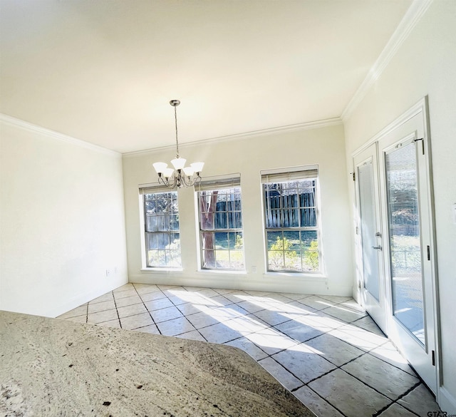 unfurnished dining area with light tile patterned flooring, crown molding, and an inviting chandelier