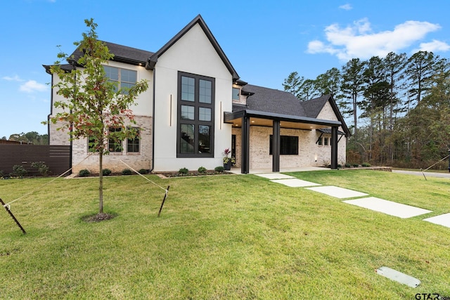 view of front of home featuring a front lawn