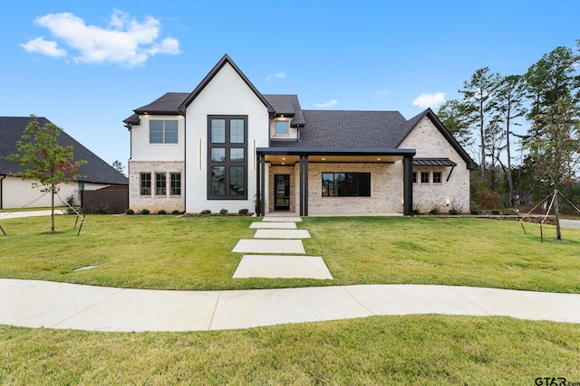 view of front facade with a front yard