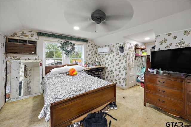 bedroom with light colored carpet, lofted ceiling, and wallpapered walls
