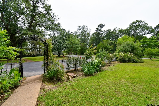 510 E Longview St, Arp, TX 75750 - view of yard with view of wooded area