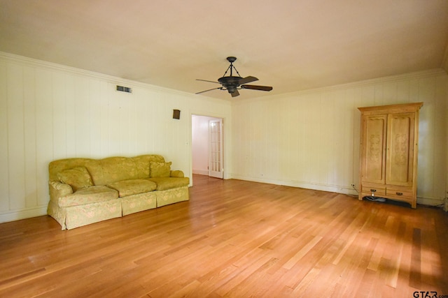 510 E Longview St, Arp, TX 75750 - living room with a ceiling fan, light wood-type flooring, and crown molding