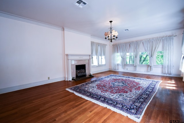 510 E Longview St, Arp, TX 75750 - living room with a chandelier, wood finished floors, a high end fireplace, and crown molding