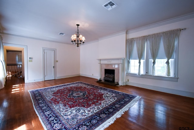 510 E Longview St, Arp, TX 75750 - living area with a chandelier, a premium fireplace, wood finished floors, baseboards, and crown molding