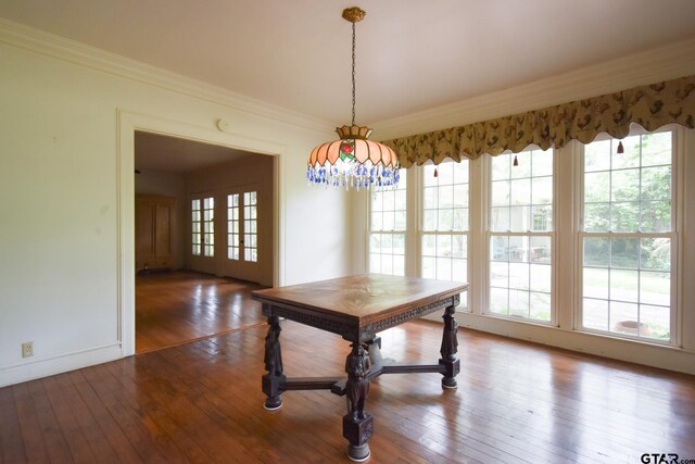 510 E Longview St, Arp, TX 75750 - dining room featuring wood-type flooring, ornamental molding, and baseboards