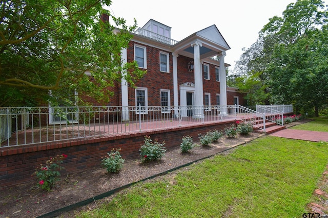 510 E Longview St, Arp, TX 75750 - neoclassical / greek revival house featuring brick siding and a patio