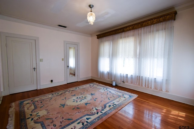 510 E Longview St, Arp, TX 75750 - unfurnished room featuring baseboards and wood finished floors