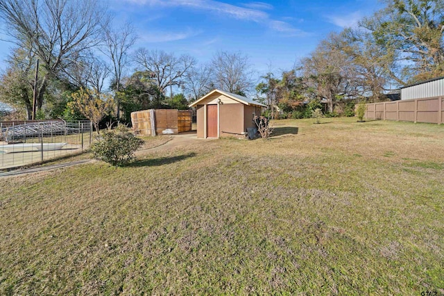 view of yard with a storage shed