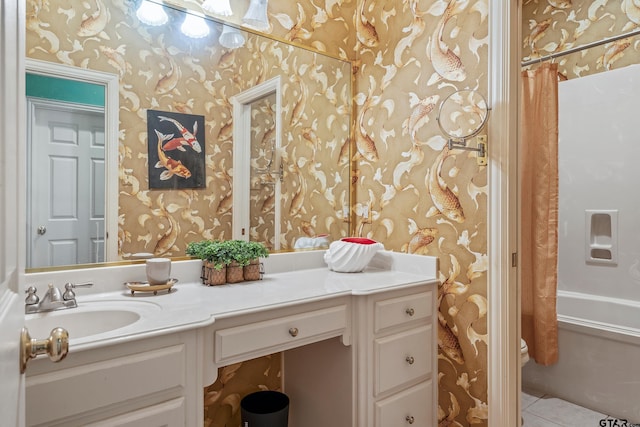 full bath featuring tile patterned flooring, shower / bath combo with shower curtain, vanity, and wallpapered walls