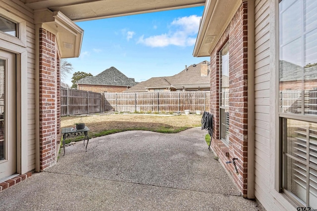 view of patio with a fenced backyard