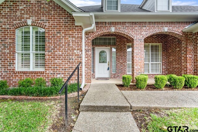 6529 Salisbury Ln, Tyler, TX 75703 - entrance to property with a shingled roof and brick siding