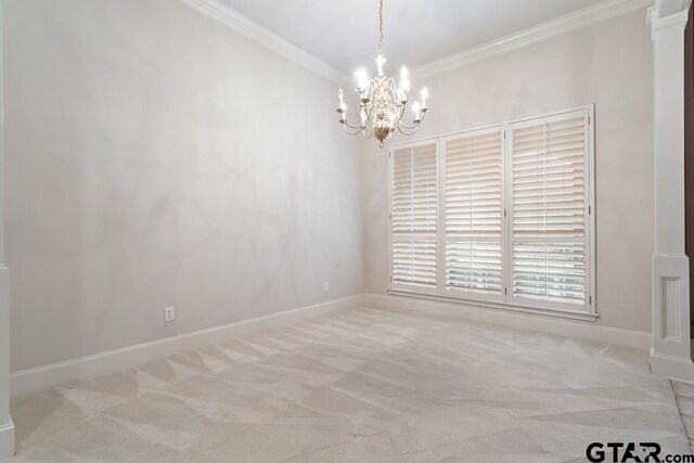 6529 Salisbury Ln, Tyler, TX 75703 - carpeted spare room featuring ornamental molding, an inviting chandelier, and baseboards