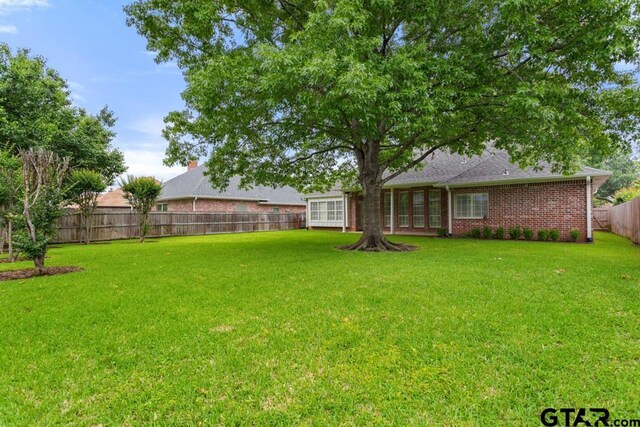 6529 Salisbury Ln, Tyler, TX 75703 - view of yard featuring a fenced backyard