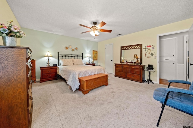 812 Jeffery Dr, Tyler, TX 75703 - carpeted bedroom featuring a textured ceiling, baseboards, and ceiling fan