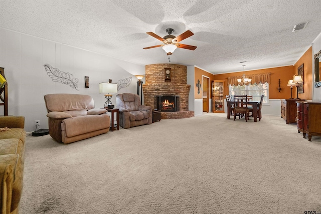 812 Jeffery Dr, Tyler, TX 75703 - carpeted living room featuring a ceiling fan, a chandelier, a textured ceiling, and a fireplace