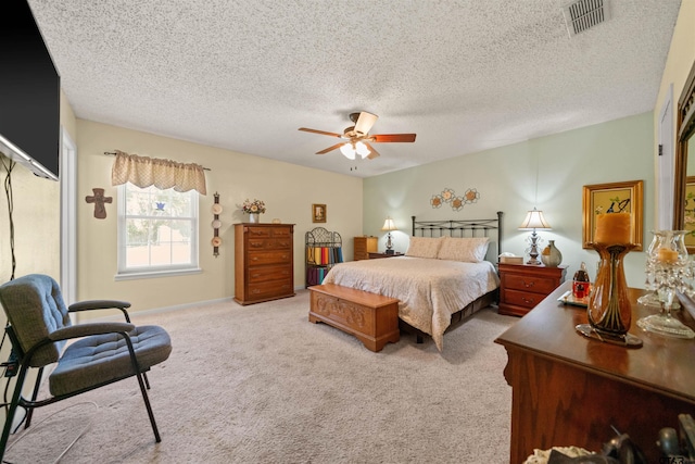 812 Jeffery Dr, Tyler, TX 75703 - bedroom featuring carpet, a textured ceiling, and ceiling fan