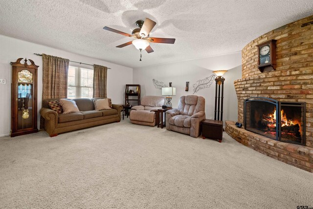 812 Jeffery Dr, Tyler, TX 75703 - living room featuring carpet flooring, a ceiling fan, a textured ceiling, and a brick fireplace