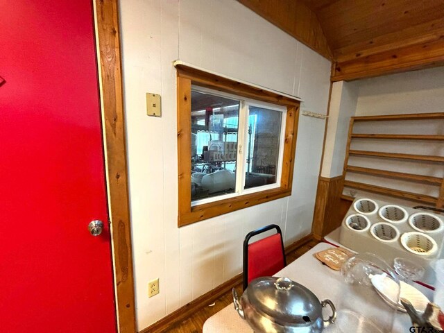 dining space with vaulted ceiling